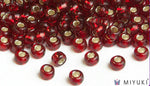 Miyuki 6/0 glass seed beads in the color 11 Silver lined Ruby