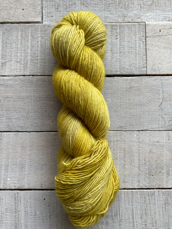 Madelinetosh Tosh Merino Light Yarn in the color Winter Wheat