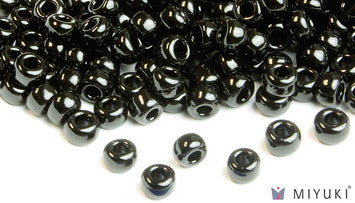 Miyuki 6/0 glass seed beads in the color 401 Opaque BlackMiyuki 6/0 glass seed beads in the color 401 Opaque Black