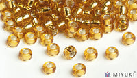 Miyuki 6/0 glass seed beads in the color 4 Silverlined GoldMiyuki 6/0 glass seed beads in the color 4 Silver lined Gold