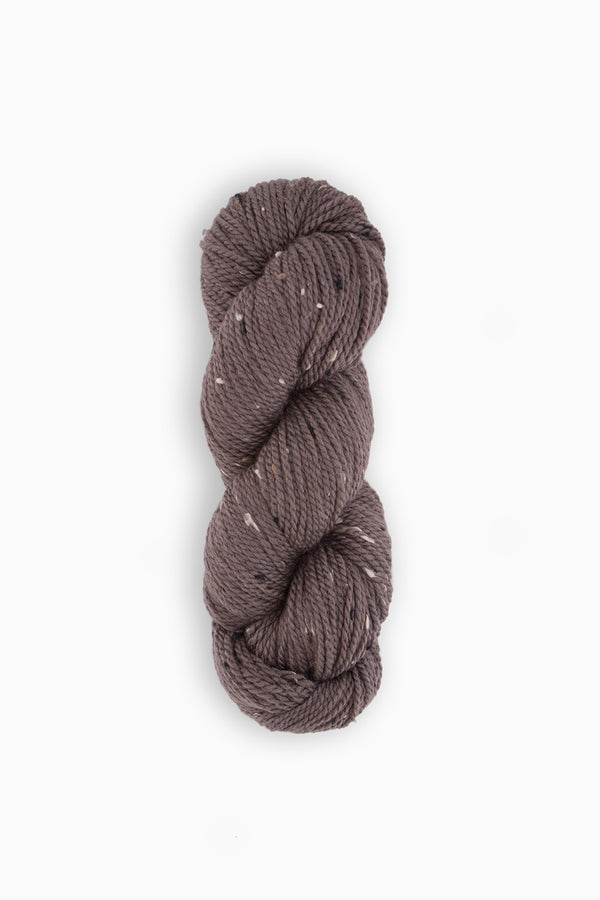 Woolfolk Fleck Yarn in the colorway F4 Raisin