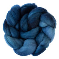 Malabrigo Nube unspun merino top hand dyed in the color Deep Ocean (blue)