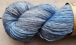 Madelinetosh Tosh Merino Light Yarn in the color Mourning Dove (medium blue)