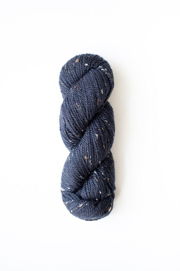 Woolfolk Fleck Yarn in the colorway F7 Navy Tweed